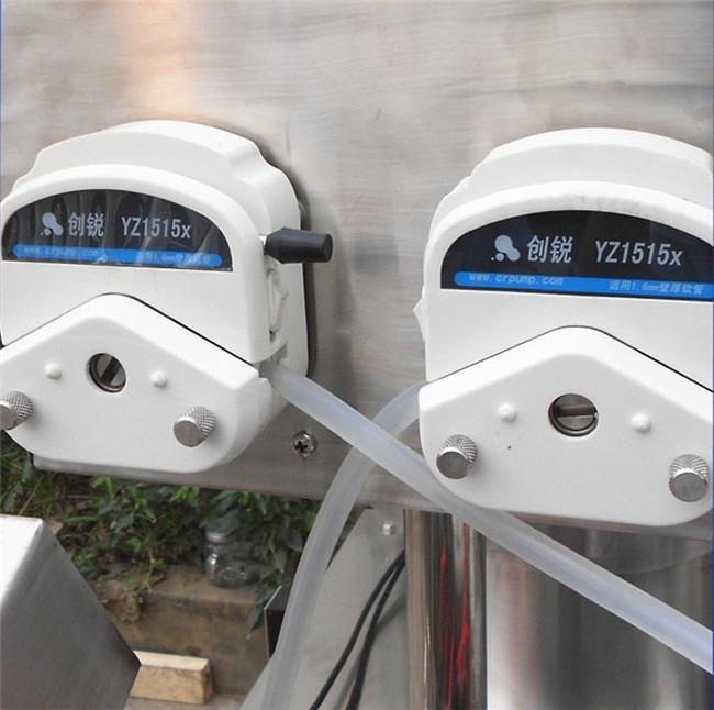 Riempitrice automatica di profumi completa con pompa peristaltica